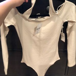 Off the shoulder body suit